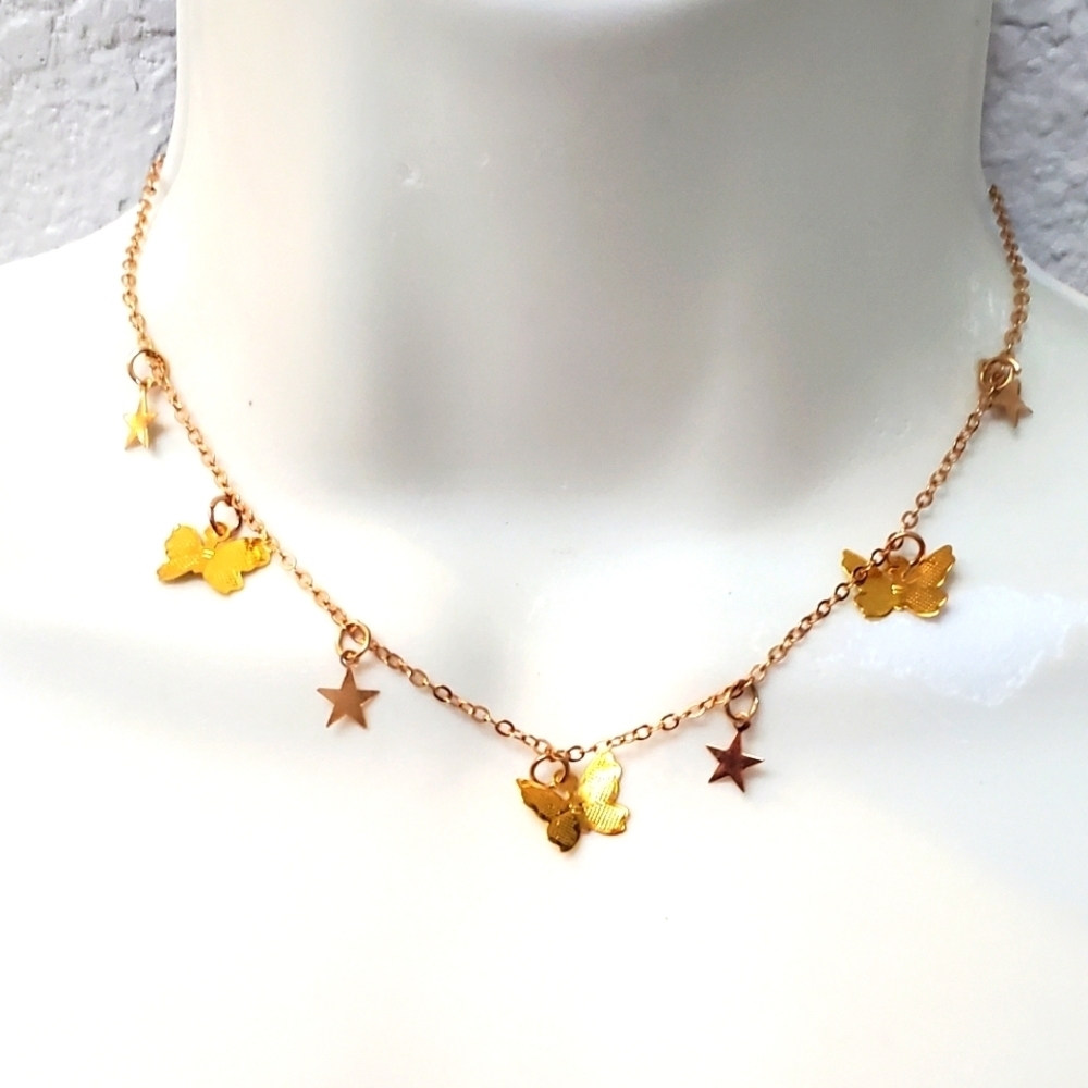💚5/$25 Gold Tone Butterfly and Star Charm Necklace